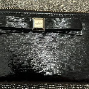 Black patent leather Wallet.